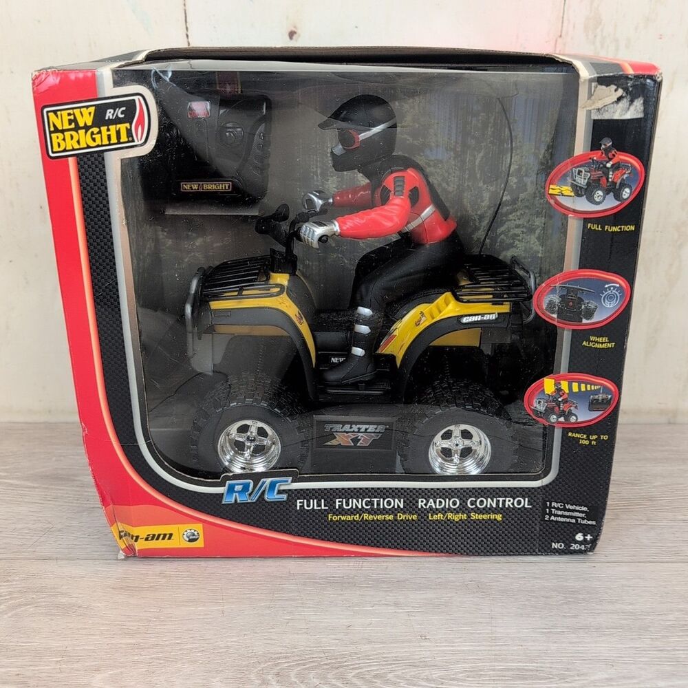 New Bright Four Wheeler ATV Traxter XT Yellow W/ Rider Radio Control Brand New